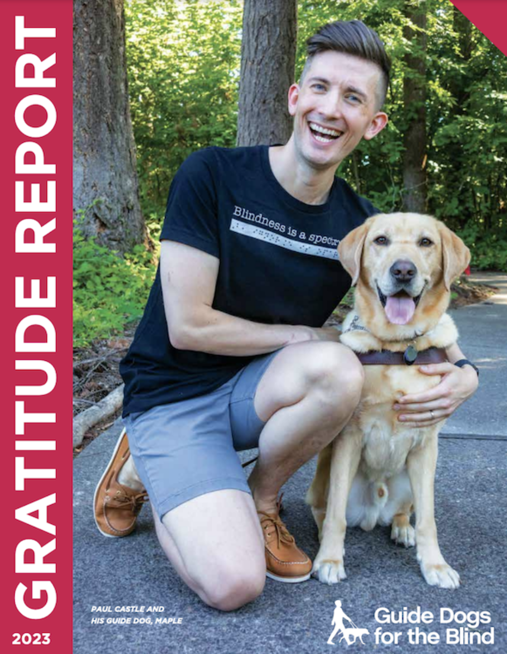 Cover of the GDB Gratitude Report featuring a smiling GDB client, Paul Castle, embracing his yellow Lab guide dog, Maple.