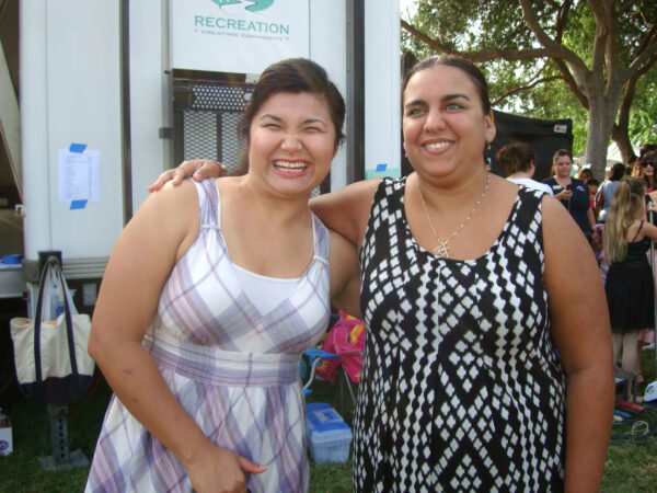 Two GDB clients smile at the camera.