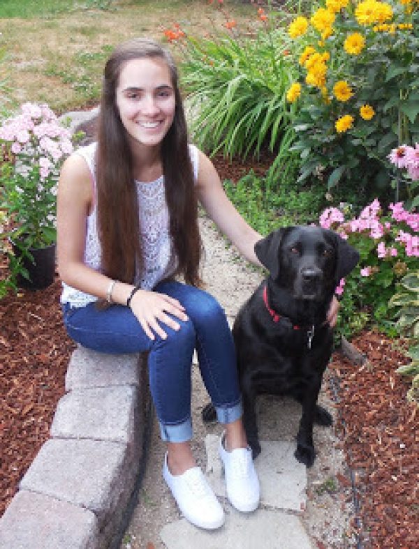 Mikeala with a black Lab